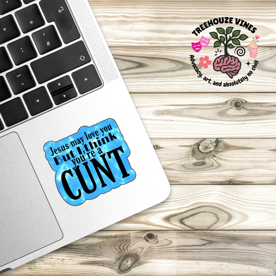 Holographic sticker that says “Jesus may love you but I think you’re a c*nt” in black text on a blue sparkle background