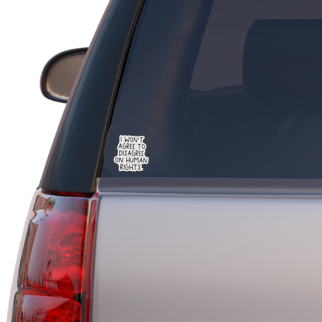 Sticker with handwritten-style text that says “I won’t agree to disagree on human rights” in bold black on white