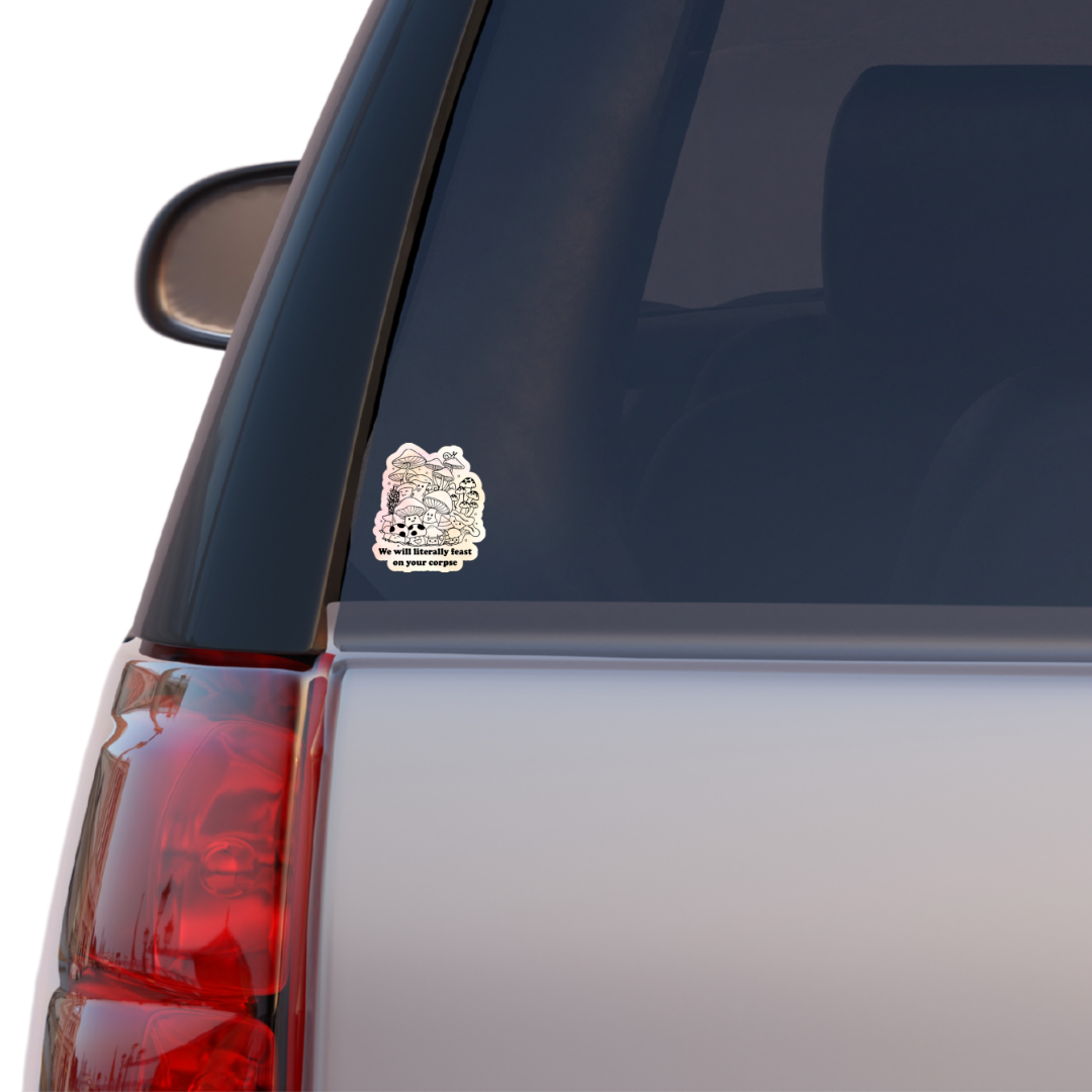 Holographic vinyl sticker with illustrated mushrooms and the phrase “We will literally feast on your corpse” in black text