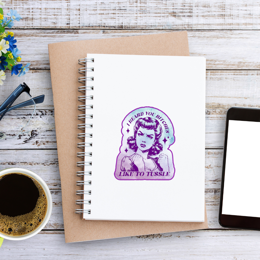 Sticker featuring a vintage-style woman with fists up and the phrase “I Heard You Bitches Like to Tussle” in purple and teal tones