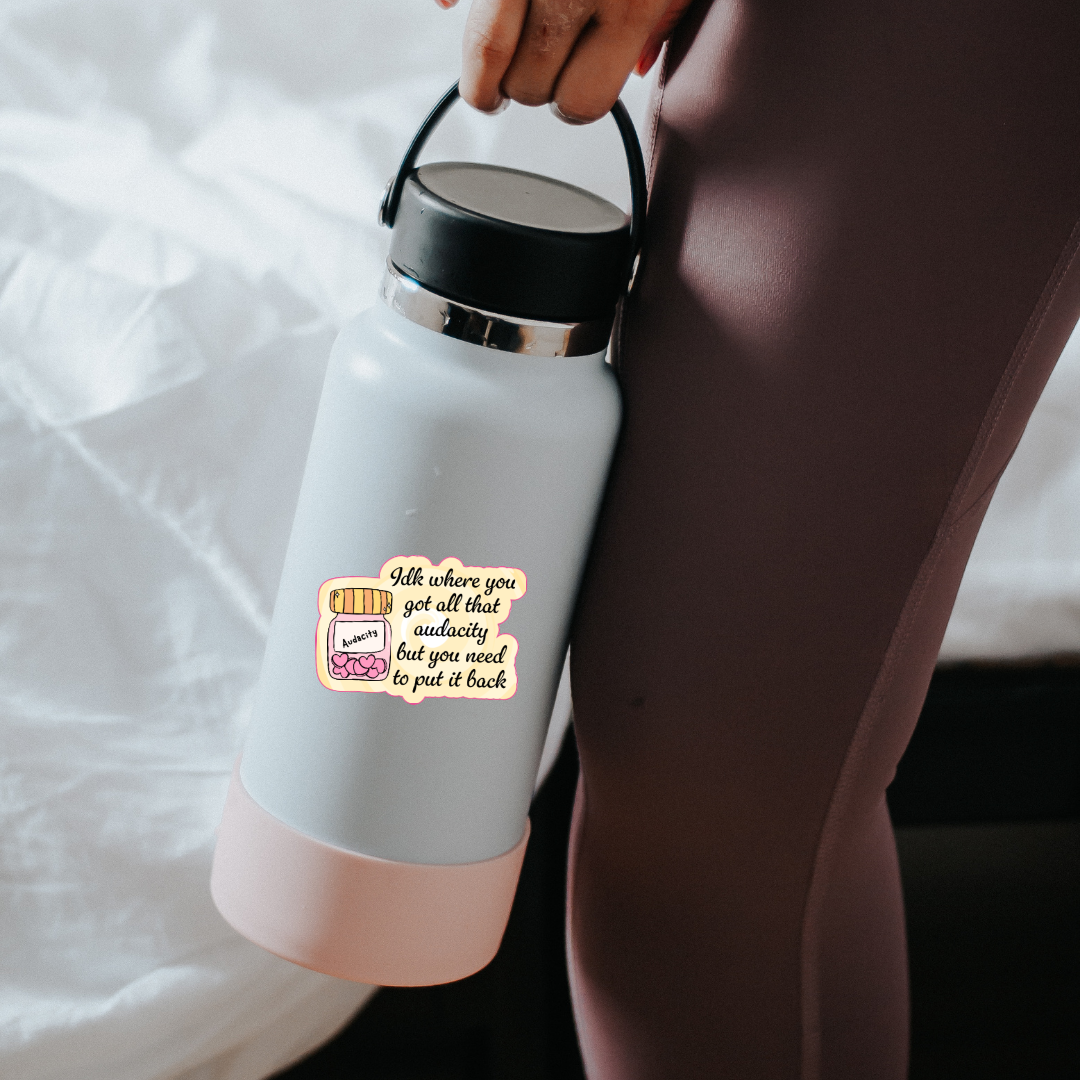 Holographic sticker with a jar labeled “Audacity” and the phrase “Idk where you got all that audacity but you need to put it back” in script font
