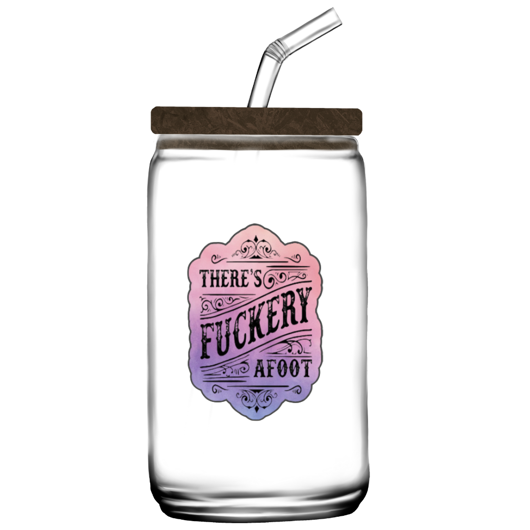 Sticker with ornate scrollwork and the phrase “There’s Fuckery Afoot” in black gothic-style lettering over a pink and purple gradient background