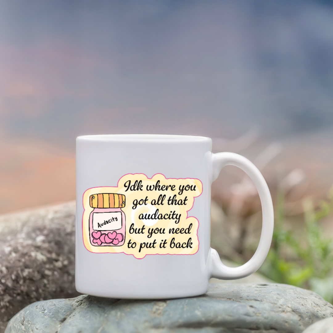 Holographic sticker with a jar labeled “Audacity” and the phrase “Idk where you got all that audacity but you need to put it back” in script font