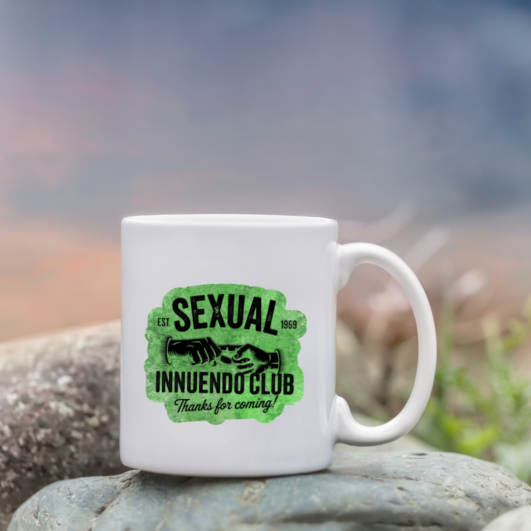 Green sticker with vintage hands and bold black text that reads “Sexual Innuendo Club – Thanks for coming!”