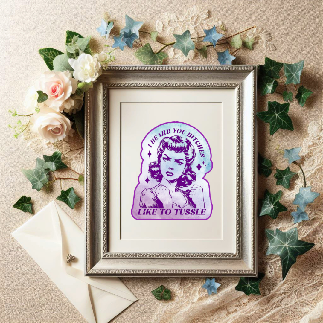 Sticker featuring a vintage-style woman with fists up and the phrase “I Heard You Bitches Like to Tussle” in purple and teal tones