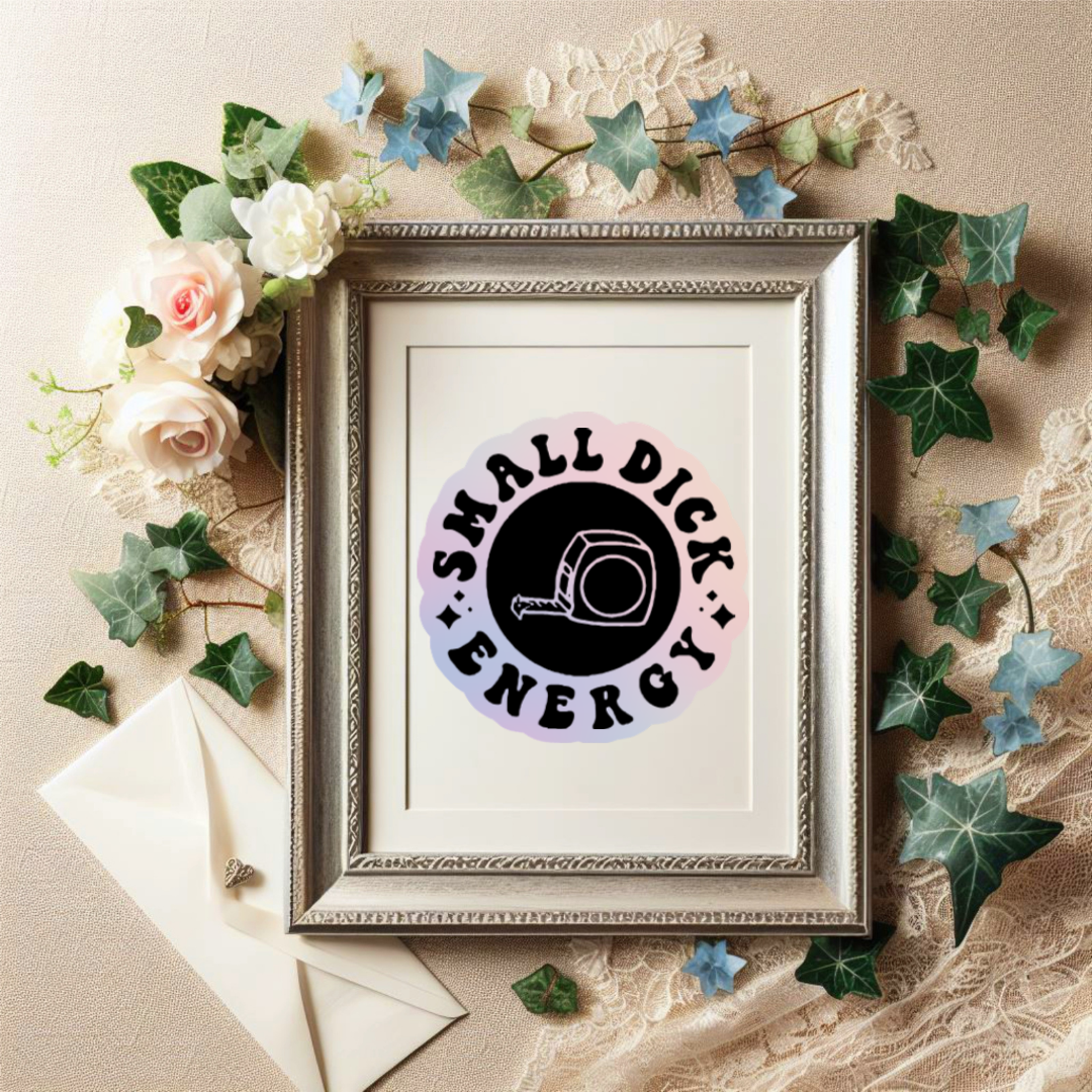 Round holographic sticker with the phrase “Small Dick Energy” and an illustrated tape measure in the center