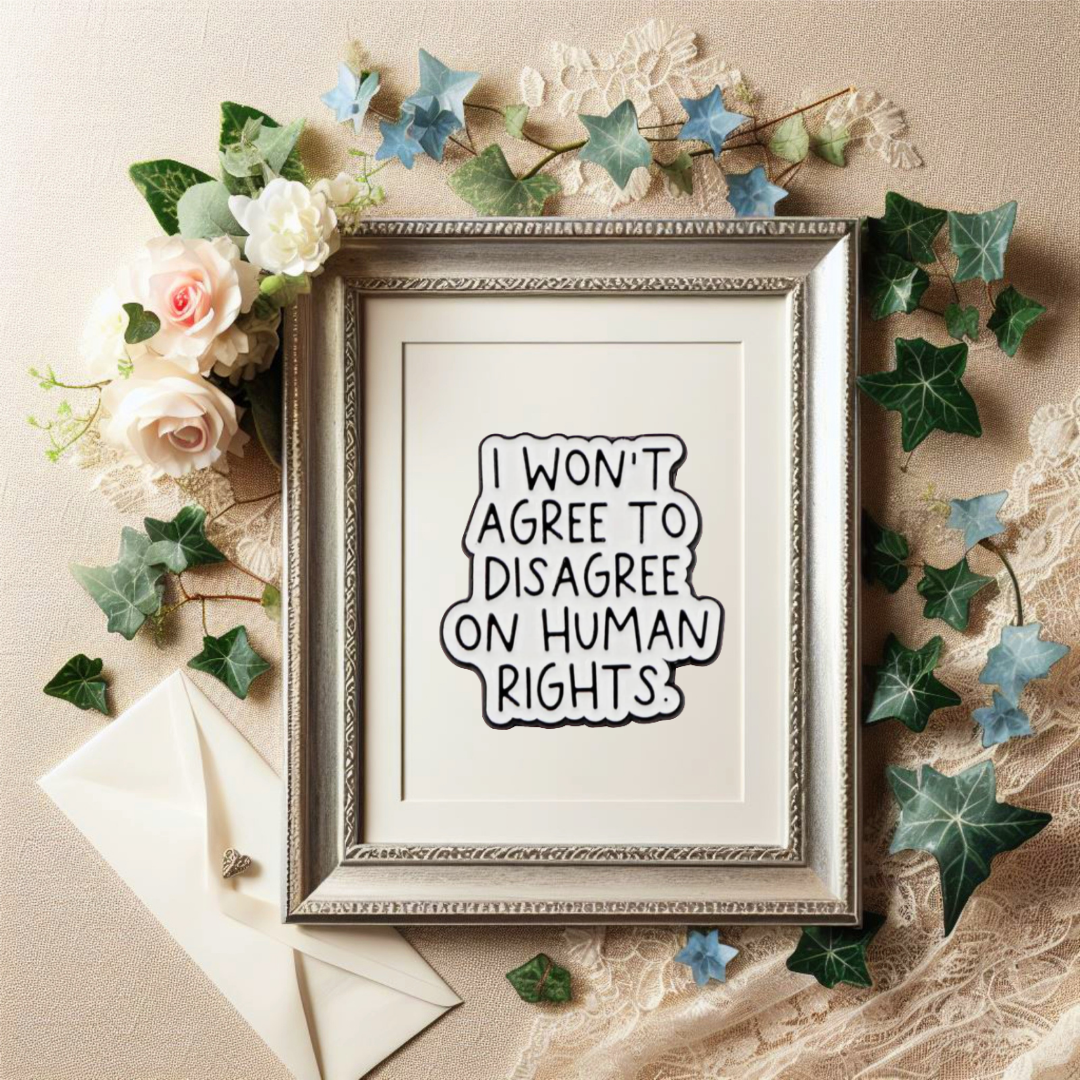 Sticker with handwritten-style text that says “I won’t agree to disagree on human rights” in bold black on white