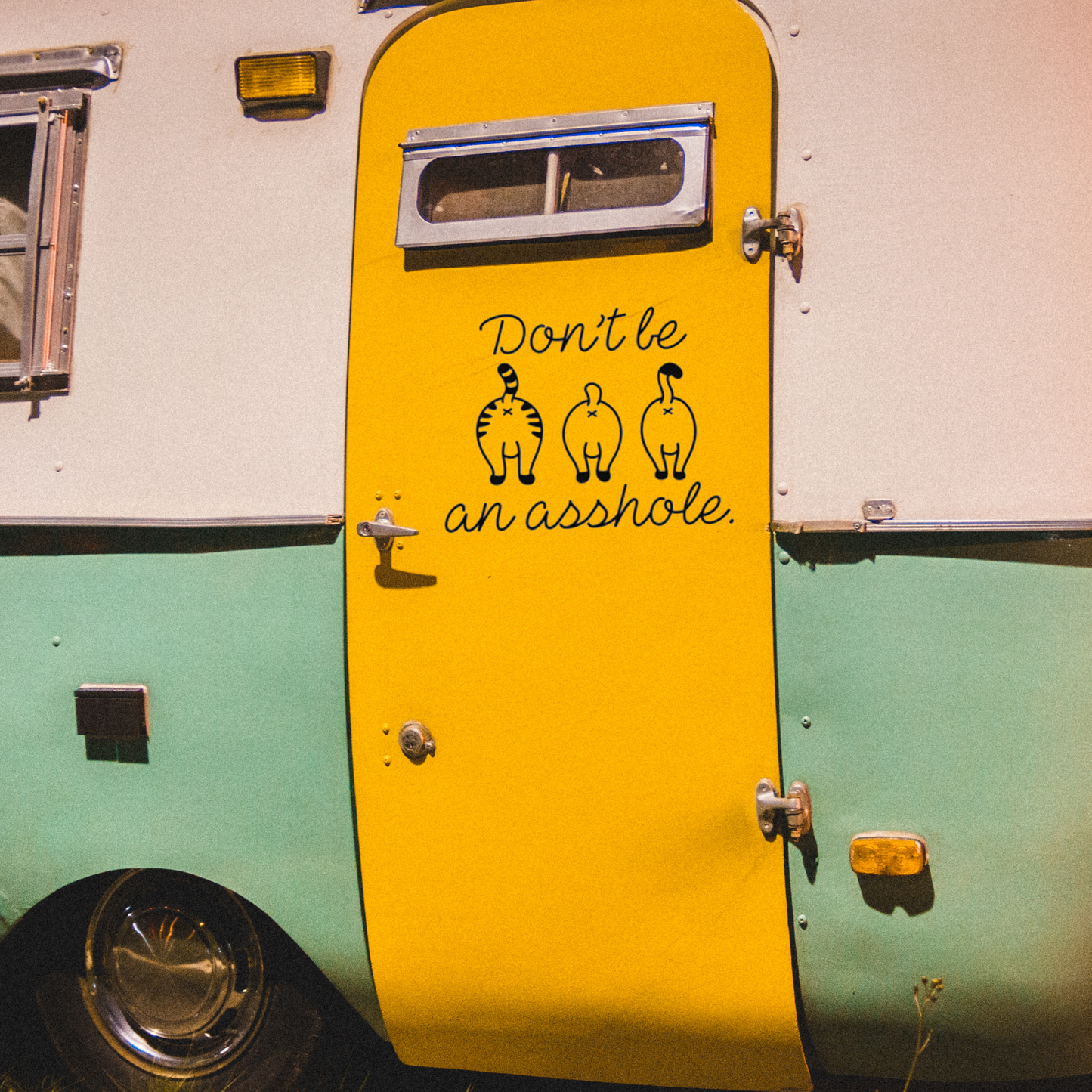 Vinyl decal with three cartoon cat butts and the phrase “Don’t be an asshole” in playful script