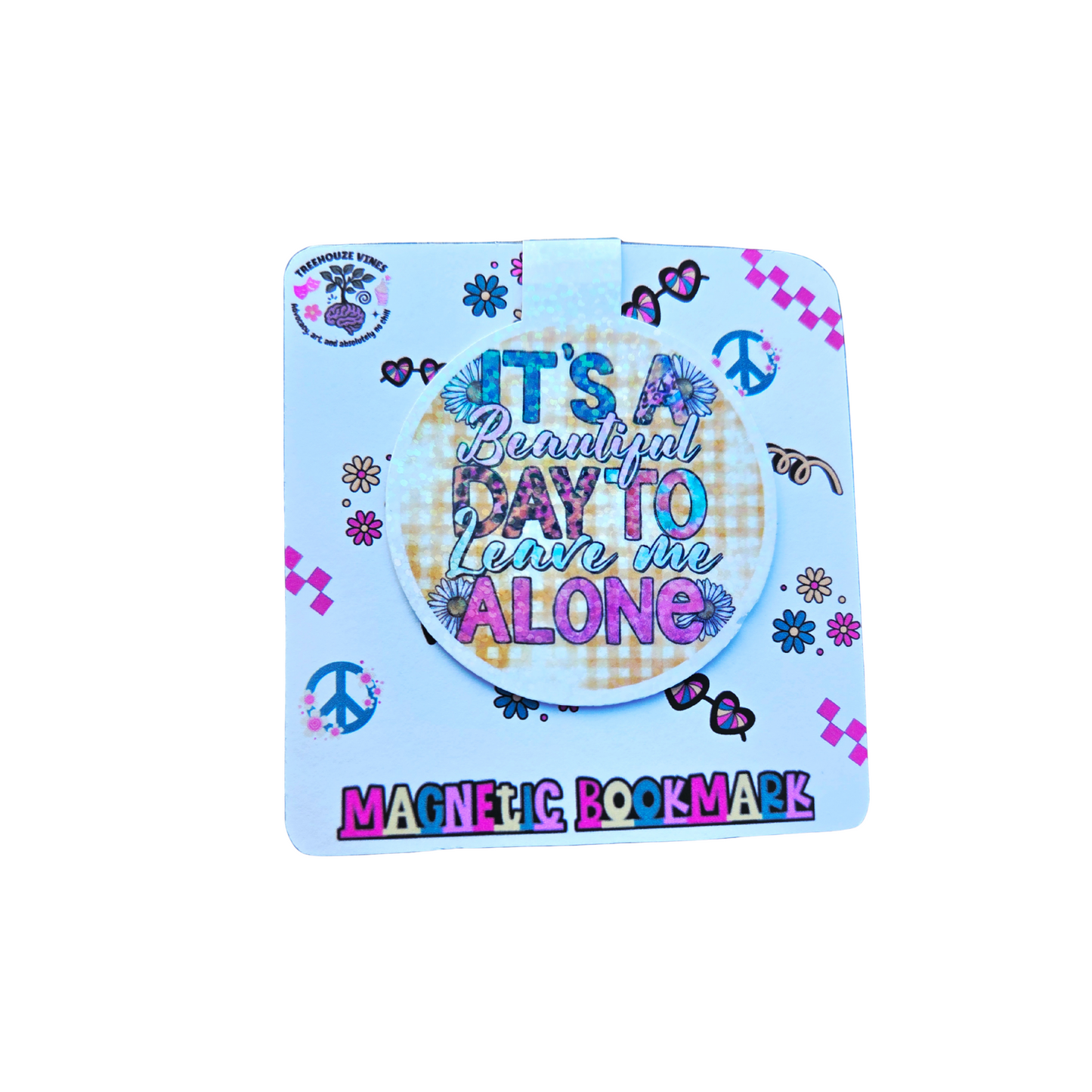Magnetic bookmark with colorful text and designs on a light blue background