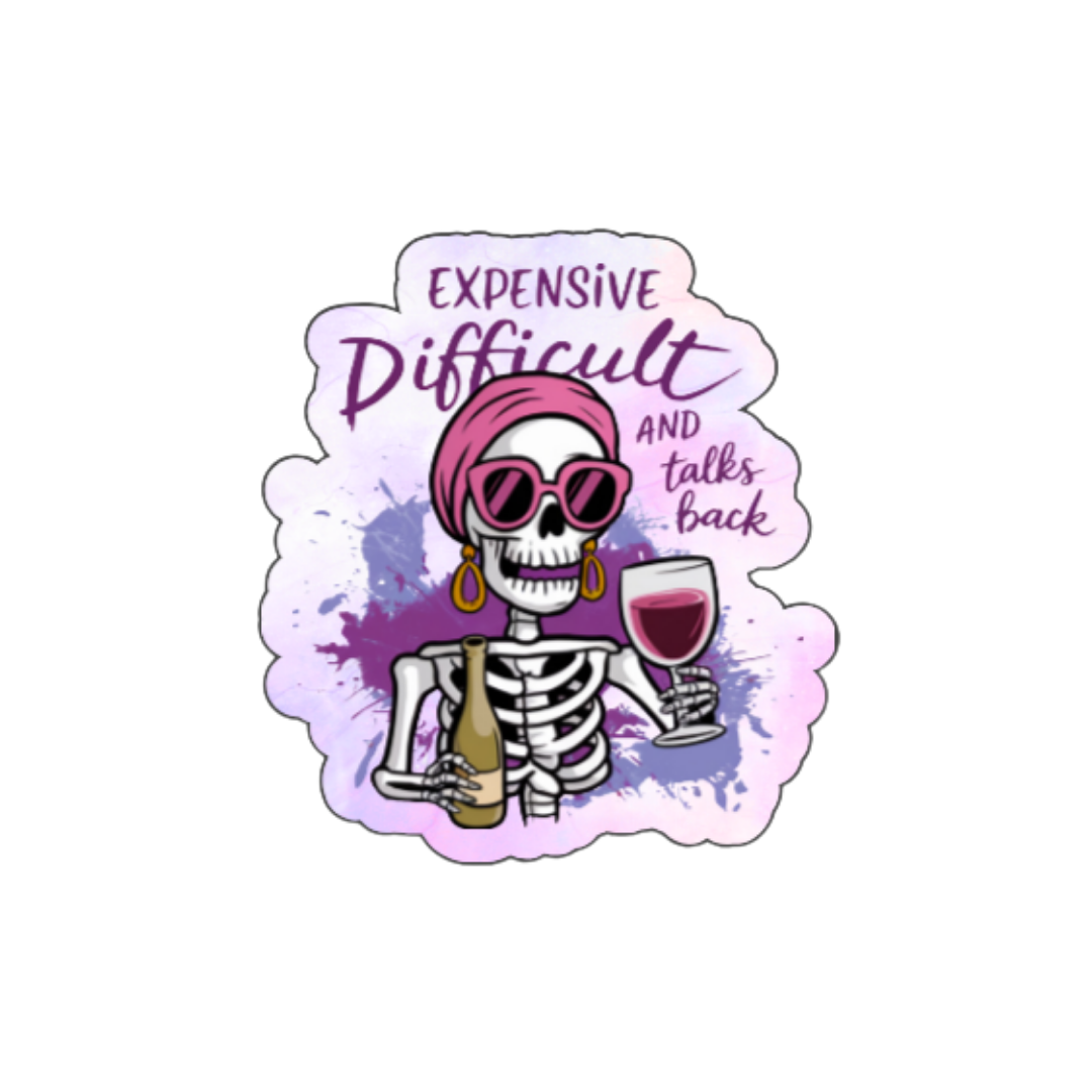 Holographic sticker showing a skeleton in a headwrap and earrings holding a wine glass, with the phrase “Expensive, Difficult, and Talks Back.”