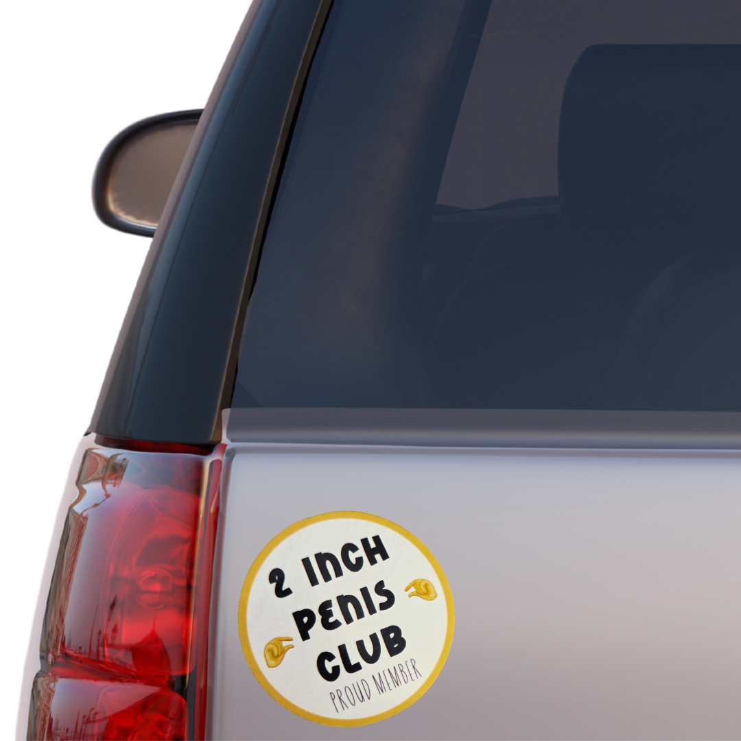 Car with a '2 Inch Penis Club' sticker on the back