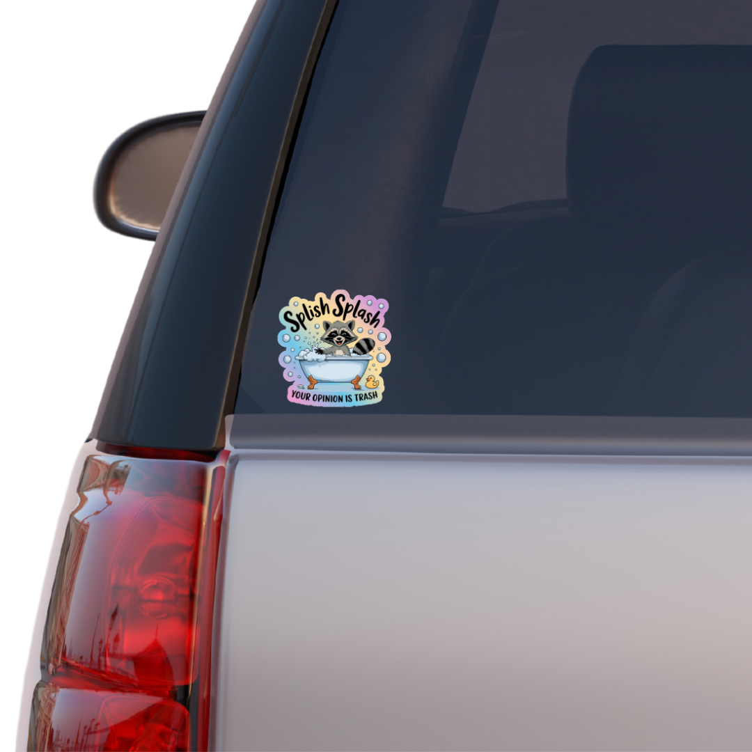 Car sticker with a cartoon raccoon design on a vehicle's rear window.