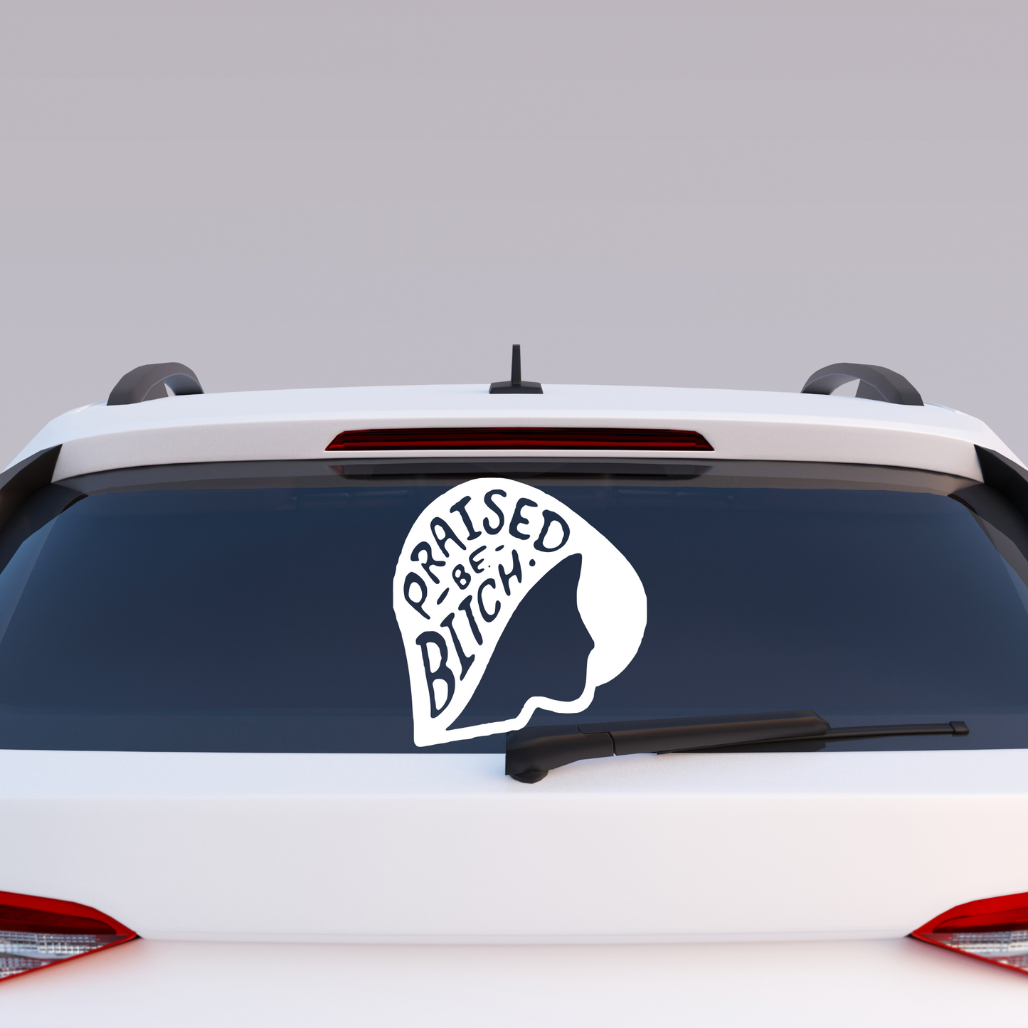 Car with a decal on the rear window that reads 'Praised Be Bitch'.