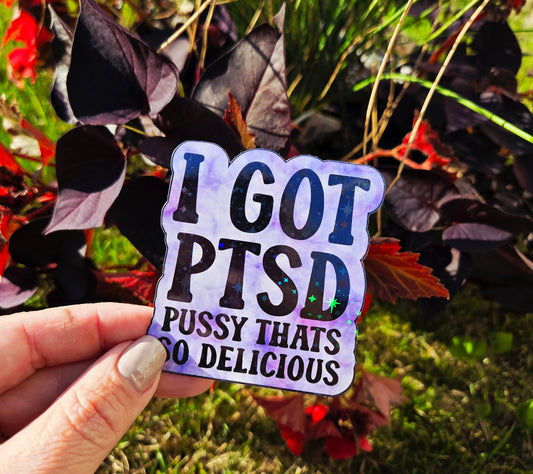 Purple tie-dye style sticker with bold black text that reads “I Got PTSD – Pussy That’s So Delicious”