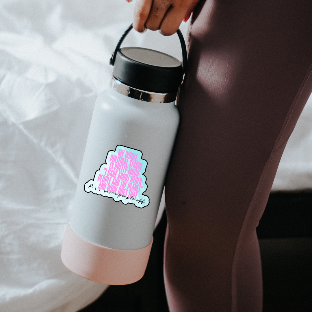 Holographic sticker with pink block text that reads “My whole political stance is pretty much ‘I care about other people and the planet’ and wow does that piss some people off”