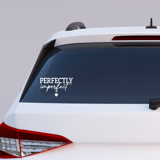 Car with 'PERFECTLY imperfect' decal on the back window