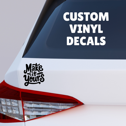 Custom vinyl decal on white car window with "Make it Yours" in bold black lettering