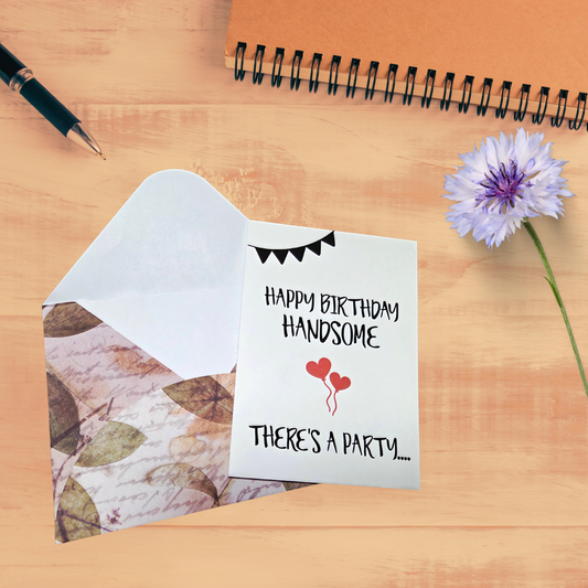 Funny adult birthday card with front text “Happy Birthday Handsome, there’s a party” and inside text “It’s in my mouth, and your d*** is invited.” Shown with handmade patterned envelope (design may vary).