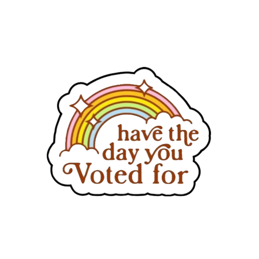 Retro rainbow sticker with the phrase “Have the Day You Voted For” in bold brown text and sparkles