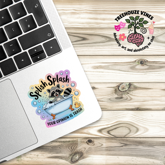 Laptop with a colorful sticker featuring a raccoon and text on a wooden surface, with Treehouze Vines logo in the corner.